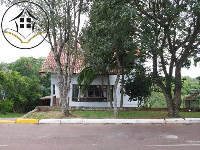 Frente - Casa a venda 4 dormitórios Condomínio Cantegril